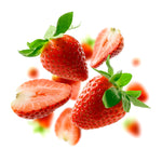 Fresh strawberries with leaves in mid air white background.